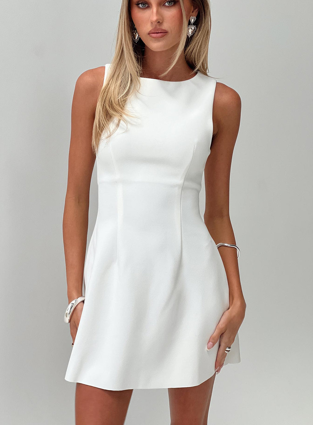 side view of model wearing Princess Polly Anse Mini Dress White Crew Neck 