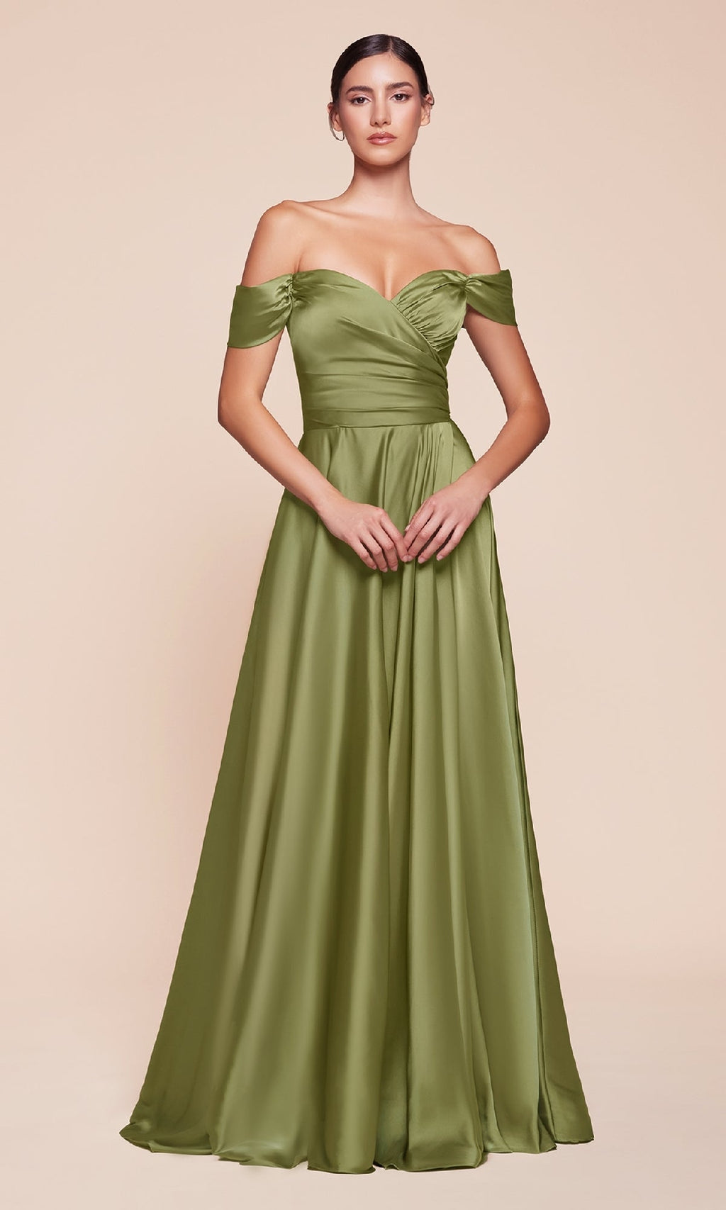 A woman models the Ladivine 7493-1 off-the-shoulder long prom dress in olive green satin, featuring a fitted bodice and flowing A-line skirt, standing against a beige background.