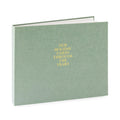 Green fabric bound album with gold foil 'our holiday cards through the years'