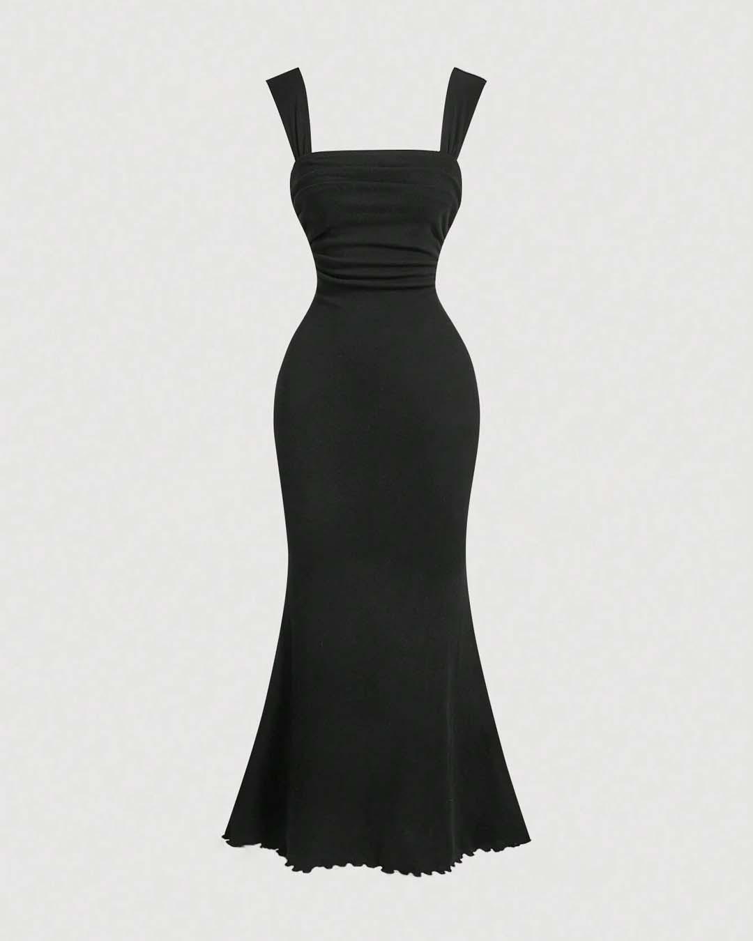 Front view of A black mermaid dress featuring a prominent white bow at the back, elegantly designed for formal occasions